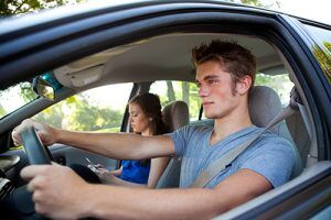 Teenagers Driving A Car Together