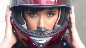 Woman Wearing A Motorcycle Helmet