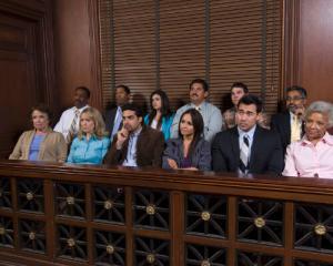 jury panel listening to a personl injury claim trial