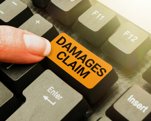 pressing a damages claim button for car accident compensation
