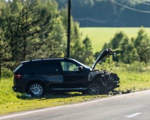 car on the side of the road after getting into a hit and run accident