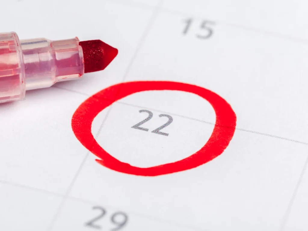 Calendar with a deadline date circled in red marker